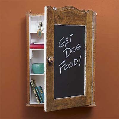 finished message center cabinet with the words get dog food written in chalk on outside