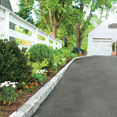 belgian blocks lining the edge of a driveway