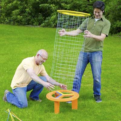 two men assembling shishkaball game