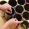 Man attaching the pipes together 