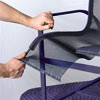 man removing old chair sling off of frame