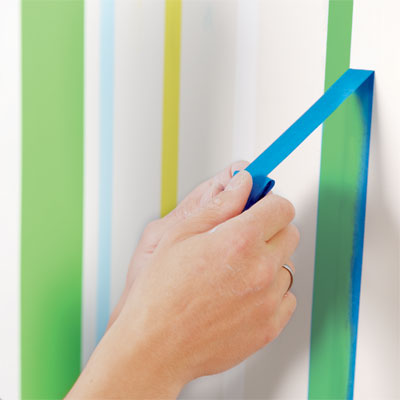 remove the tape before the the paint dries from the first round of painting a striped wall