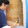 man positioning the blocking for wall niche installation