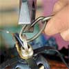 attach one end of the chain to rewire an all-weather lantern