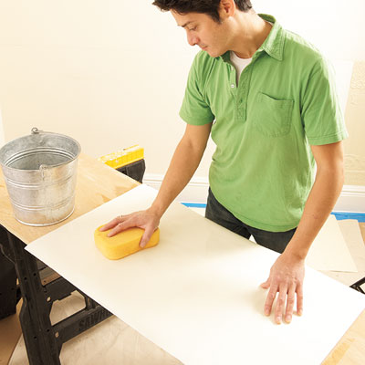 sponging the back of another Lincrusta wainscot panel