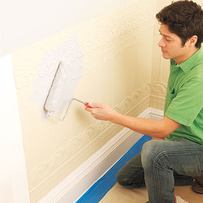 applying primer to the installed Lincrusta wainscot panels