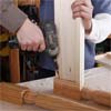 attach the apron pieces to the legs while building a display coffee table