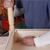 marking out the size of the table for assembly while building a display coffee table
