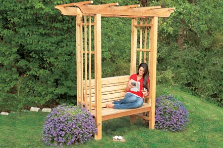 finished arbor bench with woman sitting in it