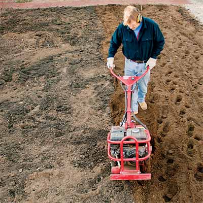 toh landscape contractor roger cook tilling the soil