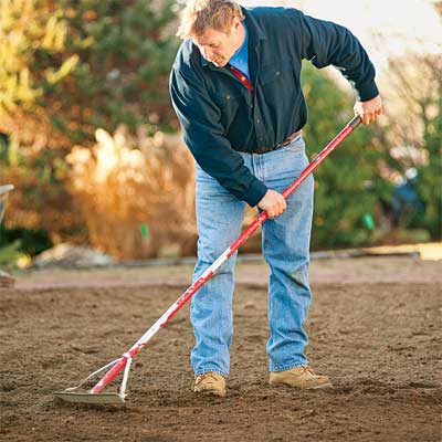 toh landscape contractor roger cook grading the soil