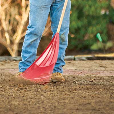 toh landscape contractor roger cook spreading seed