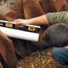 checking the pitch of the pipe that will drain water into the dry well