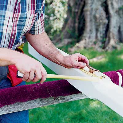 drill holes for the pivot bolt to install an in-ground flagpole