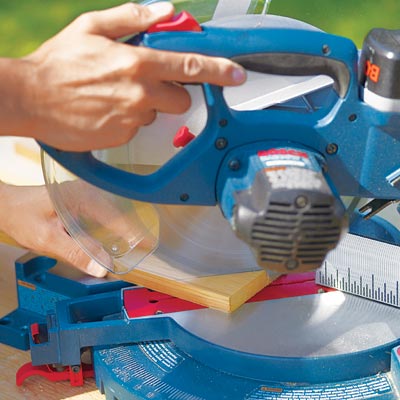 Mark Powers cuts boards to use for the structure for the hypertufa table with a miter saw