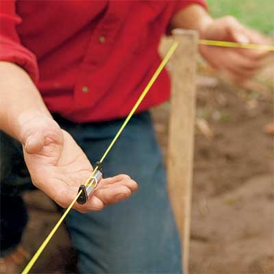 set level lines to build a stone planter