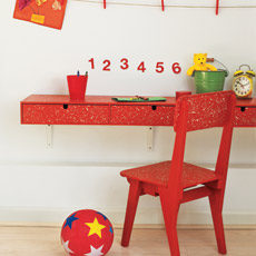 Paint spattered child's desk and chair