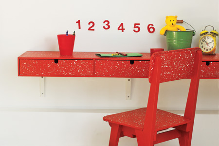 Paint spattered child's desk and chair