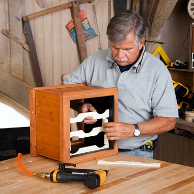 Tom Silva installs the front support strips