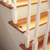 a stairway missing a baluster