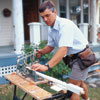 cutting the baluster to length using a miter saw