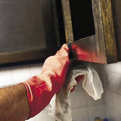 removing cabinet door with work gloves