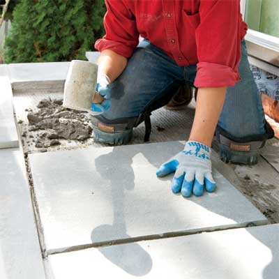 add the interior pavers to clad concrete steps in stone