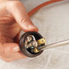 attaching a plug to the electrical cord