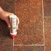 applying seam sealer to the patch joints for a smooth edge