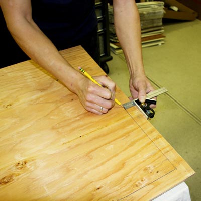 marking off the area where the trim is applied with a combination square
