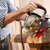 cut the beams to build a table from salvage beams