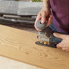 cutting the armrests of a Westport chair with a jigsaw