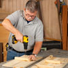Tom Silva attaching a 2x2 to 2 1x6 side boards with a drill/driver