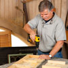 Tom Silva attaching 2x2 corner blocks to the side boards with a drill/driver
