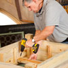 Tom Silva attaching the floor boards to the planter
