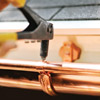 hanging the gutters for installing half-round gutters 