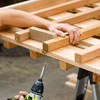 Mark Powers attaches the trellis pickets