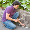measuring a driveway with a tape measure