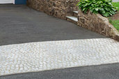 a newly installed driveway apron