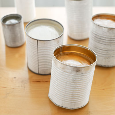 how to make tin can luminaries paint cans with ice frozen in them