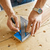 marking a 45 degree line on a wood slat for a herringbone floor using a rafter square