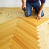 re-fastening the nailing blank to repeat the pattern of a herringbone floor
