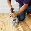 removing the excess of a herringbone pattern floor with a circular saw