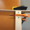 securing a glass cutter to a jig for cutting a wine bottle