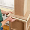 lining the columned room divider with crown molding