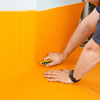 how to lay a stone-tile floor roll out plastic membrane