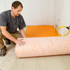 how to lay a stone-tile floor roll out the membrane
