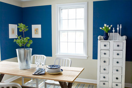 dining room painted with bands and blocks of color to mimic the look of trim