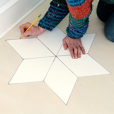 step by step how to paint a six-point star on wood floor, mark star stencil position on floor