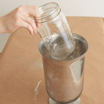 make glass look like mercury glass repeat spraying paint on outside of vase and let dry